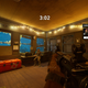 A nicely lit and cozy interior of one of the safe rooms players can find in the game.